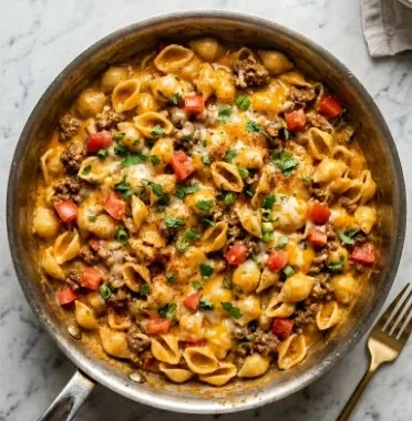 One Pot Taco Mac dish showcasing creamy pasta mixed with taco flavors.