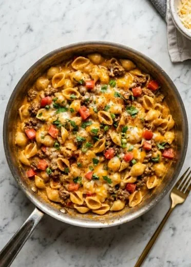 One Pot Taco Mac dish showcasing creamy pasta mixed with taco flavors.