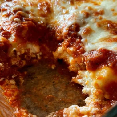 Delicious quick ravioli casserole topped with cheese and herbs