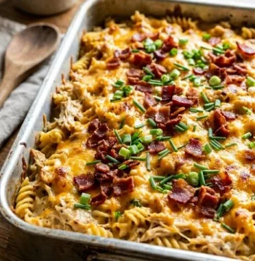 Baked Ranch Chicken Casserole served on a plate with herbs