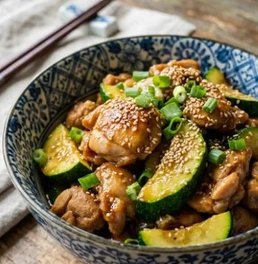 A colorful Chicken Zucchini Stir Fry with vibrant vegetables in a skillet.