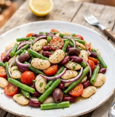 Greek Bean Salad with Lemon Marinated Beans 2 Vibrant Greek Bean Salad with lemon marinated beans and fresh vegetables.