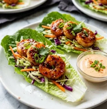 Delicious shrimp lettuce wraps filled with fresh ingredients and herbs