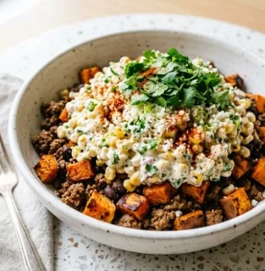 Street Corn Sweet Potato Beef Bowl with fresh ingredients and vibrant toppings