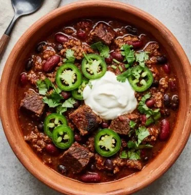 Ultimate Beef Chili 2 Bowl of ultimate beef chili with beans and spices