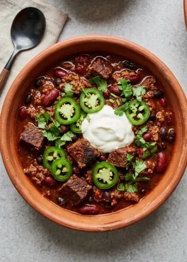 Bowl of ultimate beef chili with beans and spices