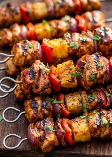 BBQ Pineapple Chicken Kabobs with vibrant colors on a grill