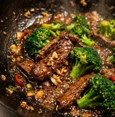 Beef and Broccoli 1 Delicious plate of Beef and Broccoli stir-fry with vibrant vegetables.