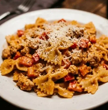 Best Parmesan Roasted Red Pepper Chicken 1 Delicious Parmesan Roasted Chicken with red peppers on a plate