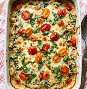 Caprese Chicken and Quinoa Casserole 1 Delicious Caprese Chicken and Quinoa Casserole topped with fresh basil and mozzarella