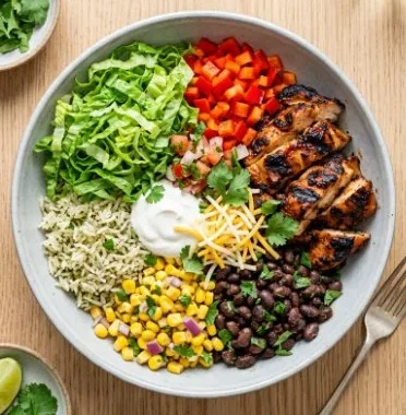 Chipotle Copycat Chicken Burrito Bowl 2 Homemade Chipotle copycat chicken burrito bowl with colorful ingredients