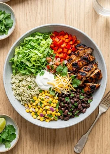 Homemade Chipotle copycat chicken burrito bowl with colorful ingredients