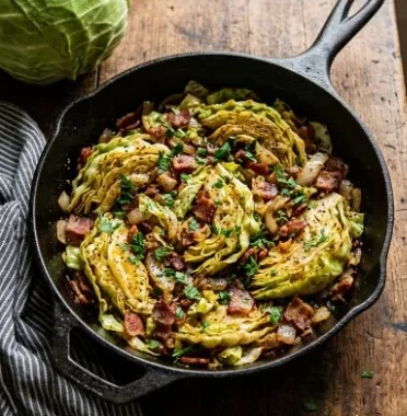 Delicious Southern Fried Cabbage with Bacon served on a plate