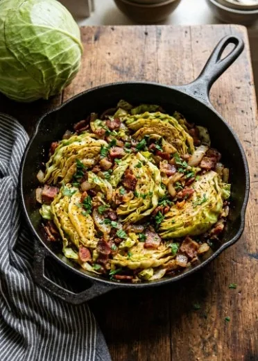 Delicious Southern Fried Cabbage with Bacon served on a plate