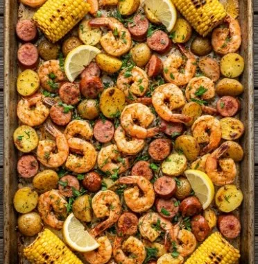 Garlic Butter Shrimp and Corn on a sheet pan, ready to serve for dinner