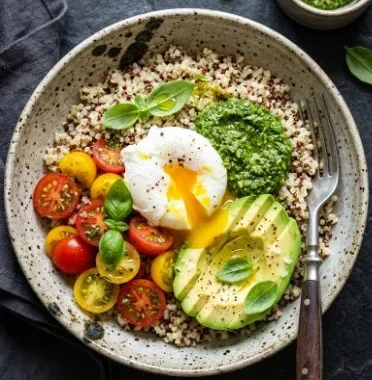 Healthy breakfast bowl filled with fruits, nuts, and grains for a balanced start.