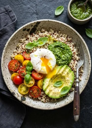 Healthy breakfast bowl filled with fruits, nuts, and grains for a balanced start.