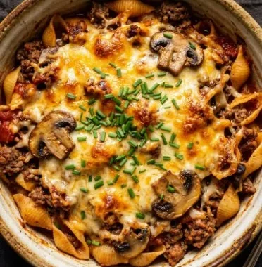 Delicious Keto Burger Casserole served in a baking dish with fresh toppings