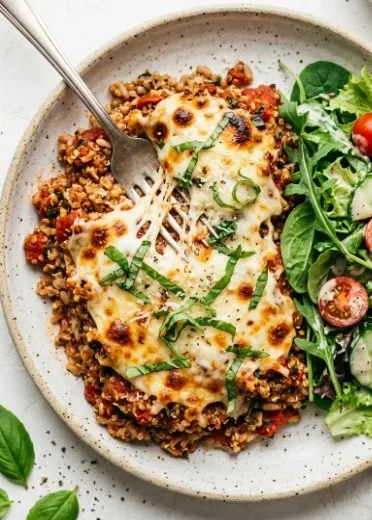 Delicious Pepperoni Pizza Casserole baked with cheese and pepperoni