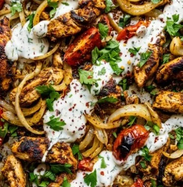 Delicious sheet pan chicken shawarma with spices and veggies