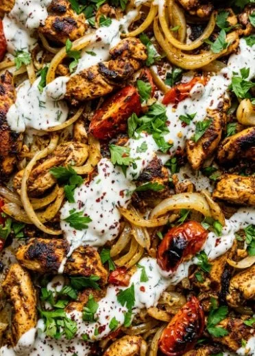 Delicious sheet pan chicken shawarma with spices and veggies