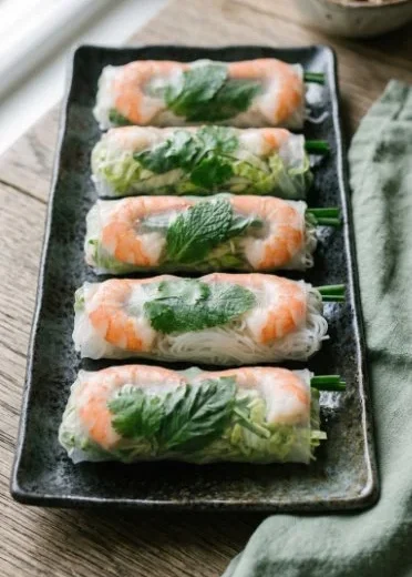 Fresh and delicious summer rolls with shrimp served on a plate