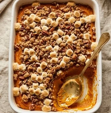 Delicious sweet potato casserole topped with fluffy marshmallows