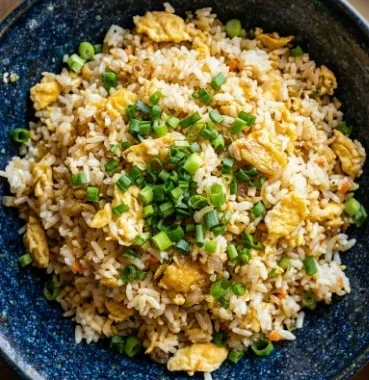 Delicious homemade egg fried rice prepared in 10 minutes.