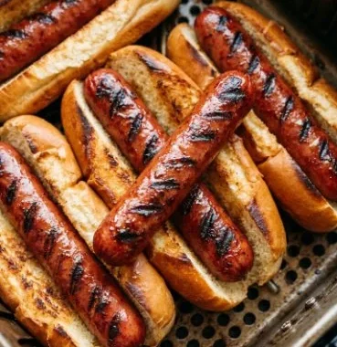 Air Fryer Hot Dogs 1 Delicious air fryer hot dogs served with toppings and condiments