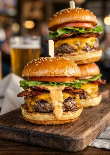 Delicious bacon cheeseburger sliders served on a platter