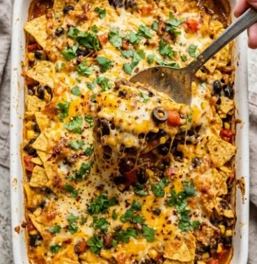 Cheesy Dorito Veggie Casserole topped with crunchy Dorito chips