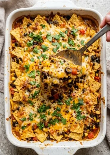 Cheesy Dorito Veggie Casserole topped with crunchy Dorito chips
