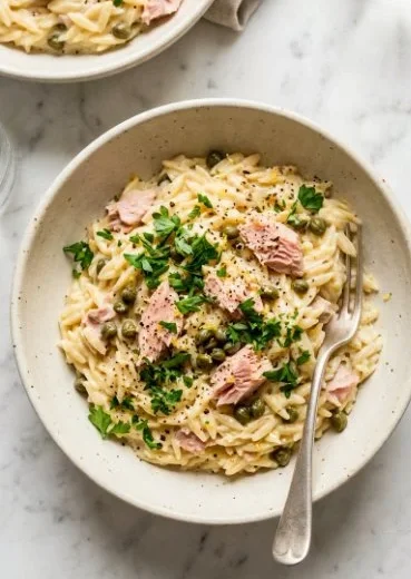 Creamy Tuna and Orzo dish served in a bowl with garnishes