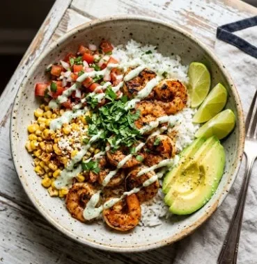 Mexican Street Corn Shrimp Bowls 1 Delicious Mexican Street Corn Shrimp Bowls with fresh ingredients and vibrant colors.