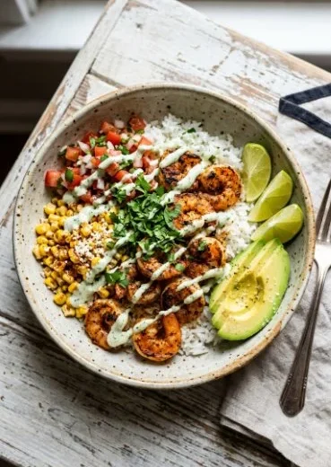 Delicious Mexican Street Corn Shrimp Bowls with fresh ingredients and vibrant colors.