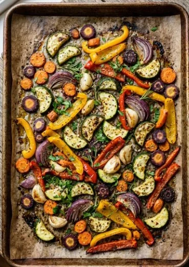 Colorful assortment of perfectly oven-roasted vegetables on a plate