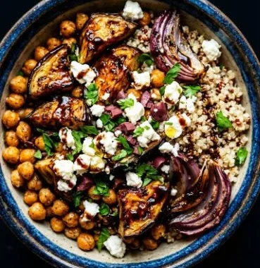 Roasted Eggplant Gyros Bowl 2 Roasted eggplant gyros bowl with fresh vegetables and sauce